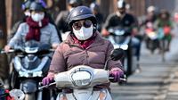 Kondisi Hanoi dengan tingkat polusi udara tinggi yang ditandai oleh kabut asap pekat pada Kamis, 2 Januari 2025. (dok. Nhac NGUYEN / AFP)