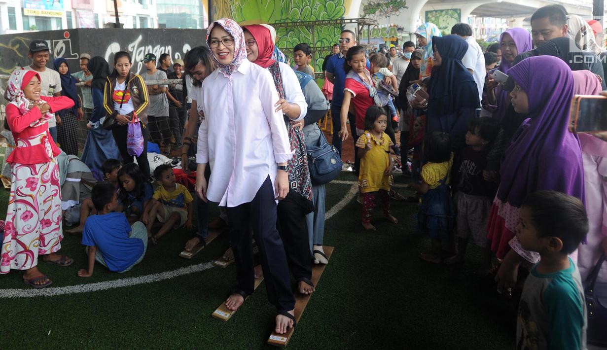 FOTO: Rayakan Hari Anak Nasional, Wali Kota Airin Jajal Beragam - Hari Anak Nasional Permainan Tradisional