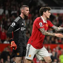 Pertandingan antara Manchester United kontra Chelsea di ajang Liga Inggris 2022/2023 hari Jumat (26/05/2023) dini hari WIB. Tampak pemain Chelsea, Christian Pulisic bersitegang dengan David De Gea dan ditenangkan oleh Victor Lindelof. (OLI SCARFF / AFP)(OLI SCARFF / AFP)