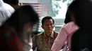 Kasianur Sidauruk diperiksa sebagai saksi dalam kasus dugaan suap kepada Hakim MK dalam gugatan Pilkada Kabupaten Tapanuli Tengah pada 2011, Senin (15/12/2014). (Liputan6.com/Miftahul Hayat)