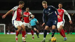 Menghadapi Manchester United, Arsenal menunjukkan ketangguhan dan berhasil menekuk The Red Devils dengan skor 2-0. (Adrian Dennis/AFP)