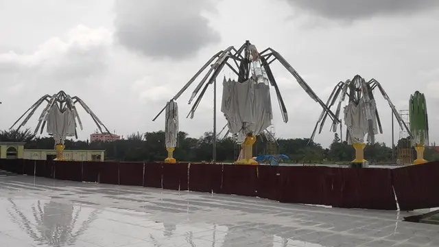 Penampakan payung elektrik Masjid An-Nur Pekanbaru yang tak selesai meski dianggarkan Rp42 miliar.