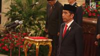Presiden Joko Widodo saat memimpin penganugerahan gelar Pahlawan Nasional di Istana Negara, Jakarta, Kakis (8/11). Keputusan penganugerahan gelar Pahlawan Nasional termaktub dalam Keputusan Presiden Nomor 123/TK/2018. (Liputan6.com/Angga Yuniar)