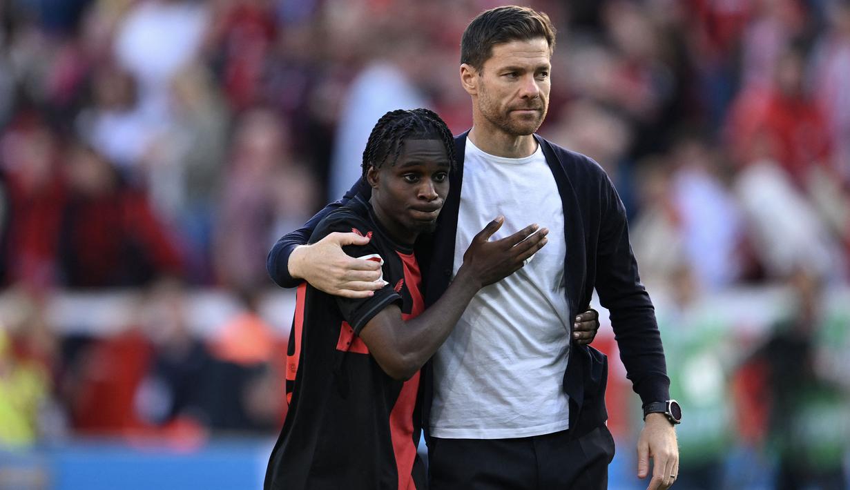 Jeremie Frimpong didatangkan Bayer Leverkusen pada tengah musim 2020/2021 dari klub Skotlandia, Glasgow Celtic dengan nilai transfer hanya 11 juta euro. Sebelum membela Glasgow Celtic, Jeremie Frimpong merupakan pemain didikan Akademi Manchester City yang belum sempat dipromosikan ke tim senior. Saat membela tim Man City U-23 ia memutuskan pindah ke Glasgow Celtic pada awal musim 2019/2020. Di Bundesliga musim 2023/2024 ia telah tampil dalam 19 laga dengan torehan 5 gol dan 7 assist. (AFP/Ina Fassbender)