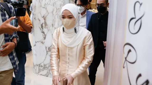 Wajah Nissa Sabyan dan Ayus terekam kamera pewarta datang ke acara pernikahan Ria Ricis dan Teuku Ryan (Kapanlagi/ Bayu Herdianto)