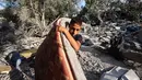Kementerian Kesehatan Gaza pada Jumat 11 Juli 2025 mengonfirmasi bahwa setidaknya 57.823 warga Palestina tewas dalam perang genosida Israel di Jalur Gaza sejak 7 Oktober 2023. (Eyad BABA/AFP)