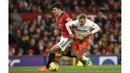 Permainan bagus dari Maguire saat bertemu West Ham memungkinkan dirinya untuk menjadi pilihan utama Erik Ten Hag kedepan sebelum Piala Dunia 2022 dimulai. (AFP/Oli Scarff)
