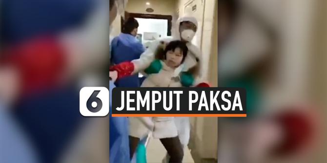 VIDEO: Penjemputan Paksa Sebuah Keluarga di China karena Menolak Karantina