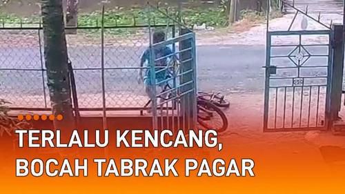 VIDEO: Terlalu Kencang Naik Sepeda, Bocah Tabrak Pagar Rumah Warga