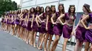 Gaya grid girl F1 GP Baku di Sirkuit Baku, Azerbaijan, Minggu (19/6/2016). (AFP/Andrej Isakovic)