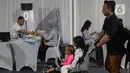 Layanan paspor saat Festival Imigrasi untuk 1.075 orang pemohon. (Liputan6.com/Angga Yuniar)