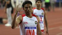 Lalu Muhammad Zohri gagal menyumbangkan medali bagi Indonesia di nomor 4x100 m estafet putra SEA Games 2021. Namun, pelari berusia 21 tahun itu menargetkan medali emas di nomor 100 meter putra. (Bola.com/Ikhwan Yanuar)
