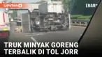 Pecah Ban, Truk Pengangkut Minyak Goreng Terbalik di Tol Jorr