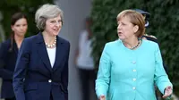 PM Inggris Theresa May dan Kanselir Jerman Angela Merkel (Standard)