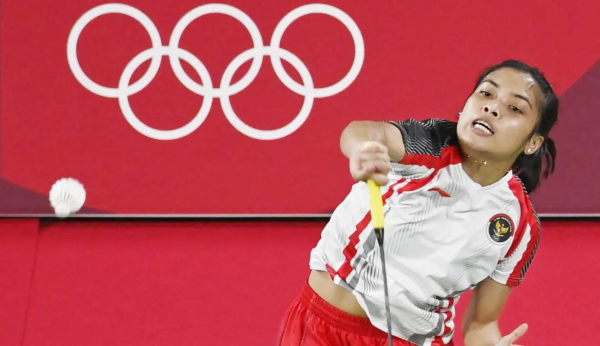 Wakil Indonesia, Gregoria Mariska Tunjung, berhasil memastikan satu tempat di babak perempat final bulutangkis nomor tunggal putri Olimpiade Tokyo 2020, Rabu (28/7/2021). (Foto: AFP/Alexander Nemenov)