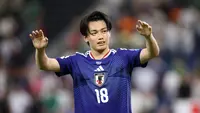 Penyerang Timnas Jepang, Ayase Ueda, yang mencetak dua gol, melambaikan tangan kepada para penggemar di akhir pertandingan sepak bola Piala Dunia 2026 Grup F antara Tunisia dan Jepang di Stadion Monterrey, Guadalupe, Meksiko, pada 20 Juni 2026. (Julio Cesar AGUILAR / AFP)