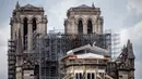 Kondisi Katedral Notre-Dame yang tengah dipugar di Paris, Prancis, Senin (27/4/2020). Renovasi Katedral Notre-Dame dilanjutkan kembali setelah sempat dihentikan sejak 17 Maret lalu akibat epidemi COVID-19. (Xinhua/Aurelien Morissard)