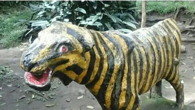 patung macan kocak