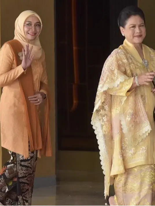 Ibu Negara, Iriana Joko Widodo tampil mengenakan kebaya kuning berbordir serasi dengan selendang dan kain bawahannya. Sambil membawa tas hitamnya. [Instagram/@sekretariat.kabinet]