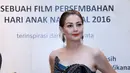 Roweina menjadi ibu yang sangat kejam. Ia menyiksa anaknya hingga menginggal dunia. Itulah gambaran peran baru Roweina Umboh dalam film Untuk Angeline. (Galih W. Satria/Bintang.com)