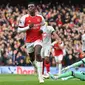 Striker Arsenal Eddie Nketiah berselebrasi setelah mencetak gol ke gawang Sheffield United dalam pertandingan Liga Inggris di Emirates Stadium, London, Sabtu, 28 Oktober 2023. (Glyn KIRK / AFP)