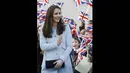 Kate Middleton yang sedang hamil anak kedua terlihat lebih cantik dan semakin modis saat menghadiri pembukaan Kensington Leisure Centre di London, Inggris, Senin (19/1/2015). (AFP PHOTO/KIRSTY WIGGLESWORTH/POOL)