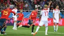 Striker Spanyol, Iago Aspas, merayakan gol yang dicetaknya ke gawang Maroko pada laga grup B Piala Dunia di Kaliningrad, Senin (25/6/2018). Gol ini tercipta pada menit ‘90+1 atau masa injury time. (AFP/Patrick Hertzog)