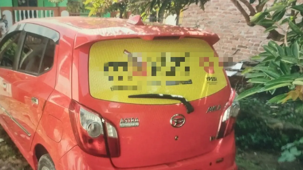 Mobil yang digunakan driver taksi online terduga pelaku pemerkosaan.