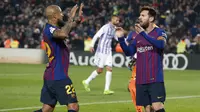 Gelandang Barcelona, Lionel Messi, merayakan gol yang dicetaknya ke gawang Valladolid pada laga La Liga di Stadion Camp Nou, Barcelona, Sabtu (16/2). Barcelona menang 1-0 atas Valladolid. (AFP/Pau Barrena)
