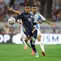 Gelandang Ekuador Kendry Paez berebut bola dengan penyerang Argentina Nicolas Gonzalez selama pertandingan sepak bola perempat final turnamen Conmebol 2024 Copa America antara Argentina dan Ekuador di Stadion NRG di Houston, Texas, pada 4 Juli 2024.CHARLY TRIBALLEAU / AFP