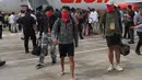 Kesemuanya WNI korban TPPO tersebut dipastikan dalam kondisi sehat. Meski terdapat lima perempuan di antaranya diketahui sedang dalam kondisi hamil. (Tatan SYUFLANA/POOL/AFP)