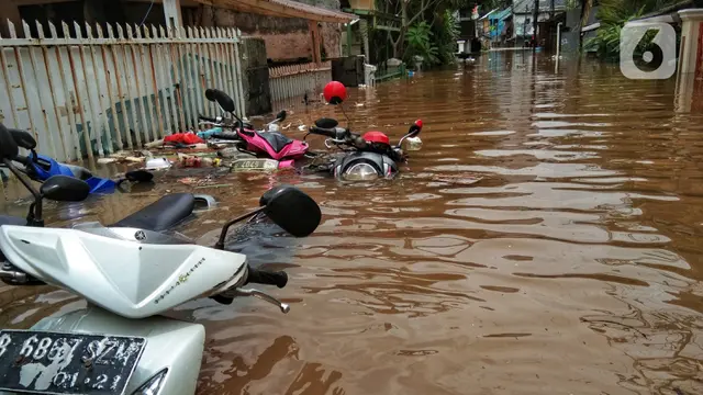 FOTO: Banjir Rendam Permukiman Warga di Kebalen
