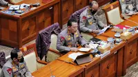 Kepala Kepolisian Negara Republik Indonesia (Kapolri) Jenderal Pol. Listyo Sigit Prabowo (tengah) saat mengikuti rapat dengar pendapat (RDP) dengan DPR RI di Jakarta, Rabu (24/8/2022). Rapat tersebut membahas kasus penembakan Brigadir J di rumah dinas Irjen Pol. Ferdy Sambo. (Liputan6.com/Angga Yuniar)