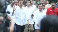 Pasangan capres dan cawapres Jokowi-JK tiba di RSPAD Gatot Soebroto, Jakarta, Kamis (22/5/14). (Liputan6.com/Herman Zakharia)