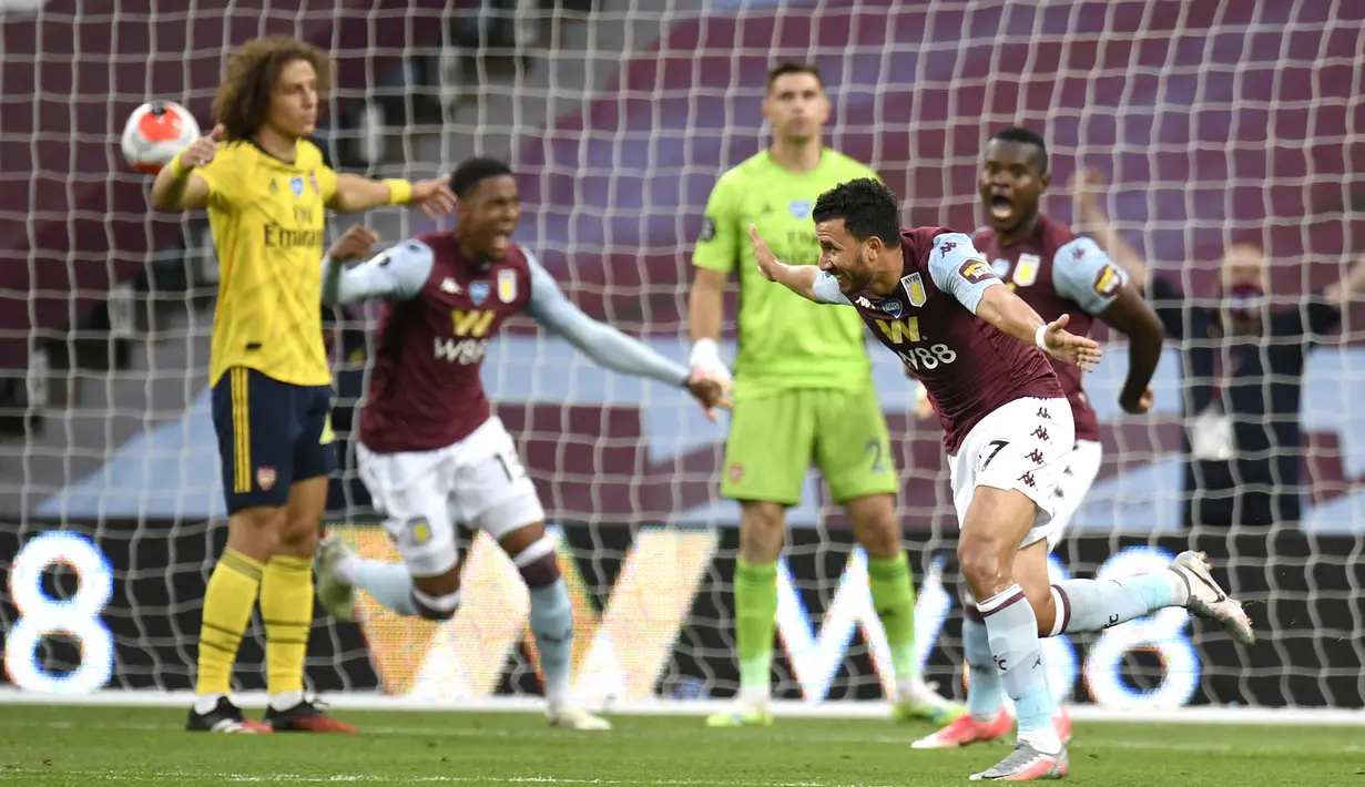 Pemain Aston Villa Trezeguet melakukan selebrasi usai mencetak gol ke gawang Arsenal pada pertandingan Liga Premier Inggris di Villa Park, Birmingham, Inggris, Selasa (21/7/2020). Aston Villa menang 1-0. (AP Photo/Peter Powell, Pool)