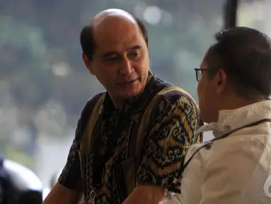 Staf Khusus Presiden Bidang Komunikasi Politik Daniel Sparingga datangi KPK, Jakarta, Selasa (9/9/2014) (Liputan6.com/Panji Diksana)