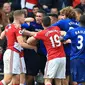 Para pemain Manchester United dan Middlesbrough terlibat keributan saat kedua tim bersua di Stadion Riverside, Minggu (19/3/2017). Cekcok antar-pemain berlanjut di lorong menuju ruang ganti pemain.  (AFP/Lindsey Parnaby)