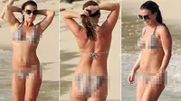 Istri Rooney Pamer Bikini Bermotif Ular di Barbados