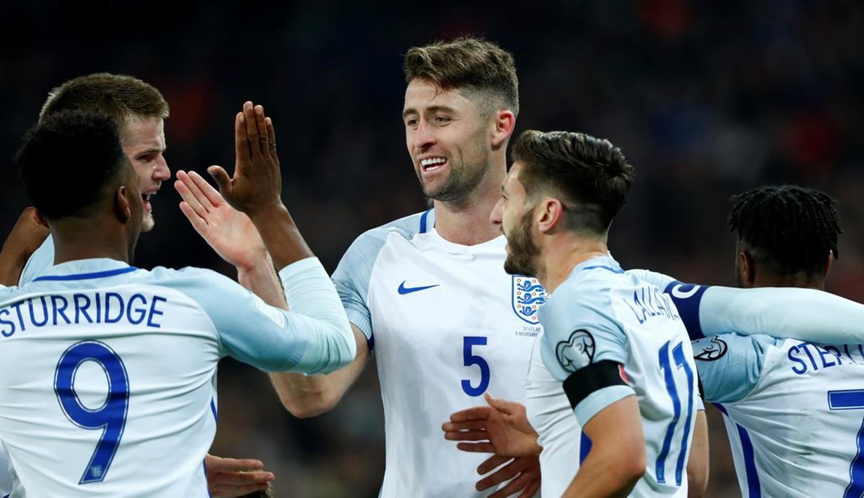 Pemain Inggris merayakan gol yang dicetak Gary Cahill ke gawang Skotlandia dalam laga Grup F Kualifikasi Piala Dunia 2018 di Stadion Wembley, Jumat (11/11/2016) waktu setempat. (Reuters/Dylan Martinez)
