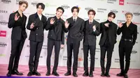 Boyband Korea Selatan, Enhypen, menghadiri acara karpet merah di acara Mama Awards 2023 di Tokyo Dome di Tokyo pada 28 November 2023. (Philip FONG/AFP)