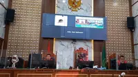 MMS Terdakwa Oknum Guru Ngaji Cabuli 10 Siswa di Depok Dijatuhi 19 Tahun Penjara Caption : Suasana pelaksanaan sidang putusan Pengadilan Negeri Depok terhadap oknum guru ngaji cabul di Depok. (Istimewa)