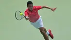 Siluet dari petenis Indonesia, M. Rifqy Fitriadi, saat berusaha mengembalikan bola saat melawan petenis Selandia Baru, Ajeet Rai, pada laga Piala Davis 2019 Grup II Zona Asia/Oceania di Stadion Tenis GBK, Jakarta, Sabtu (14/9). Rifqi kalah 6-7, 3-6 dari Ajeet. (Bola.com/Peksi Cahyo)