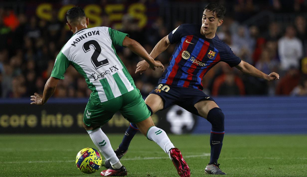 <p>Barcelona berhasil menjaga jarak 11 poin dari Real Madrid usai menang 4-0 atas Real Betis di pekan ke-32 Liga Spanyol di Camp Nou. (AP Photo/Joan Monfort)</p>