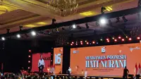 Presiden Jokowi dan Wapres Ma'ruf Amin menghadiri acara HUT ke-16 Partai Hanura di JCC Senayan, Jakarta. (Merdeka.com/Ahda Bayhaqi)