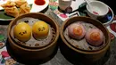Berbagai hidangan dengan hiasan imut dan lucu di restoran Dim Sum Icon, Hong Kong , China, (25). Berbagai sajian makanan disini dihiasi dengan karakter wajah dan imut yang membuat kita tak tega memakannya. (REUTERS / Bobby Yip)