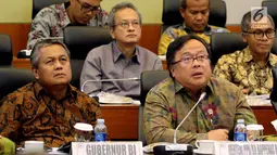 Menteri PPN/Kepala Bappenas Bambang Brodjonegoro  dan Gubernur Bank Indonesia (BI) Perry Warjiyo saat rapat kerja dengan Banggar DPR, Jakarta, Selasa (4/9). Rapat kerja membahas penyampaian pokok-pokok RUU APBN 2019. (Liputan6.com/JohanTallo)