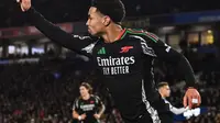 Pemain Arsenal Ethan Nwaneri saat mencetak gol ke gawang Brighton pada ajang Liga Inggris 2024/2025. (Glyn KIRK / AFP)