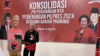 Bakal Calon Presiden (Bacapres) yang diusung dari PDI Perjuangan Ganjar Pranowo saat  menghadiri acara konsolidasi DPD PDIP NTB di Kota Mataram, Minggu (18/6/2023). (Foto: Delvira Hutabarat/Liputan6.com).