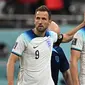 Harry Kane dan Harry Maguire dalam duel Inggris versus Iran pada laga fase grup B Piala Dunia 2022 di Khalifa Stadium, Senin (21/11/2022). (AFP/Paul Ellis)