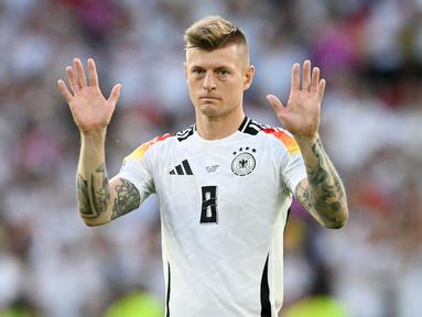 Di level klub, Kroos sudah lebih dulu pensiun setelah membawa Real Madrid menjuarai Liga Champions musim lalu. (AFP/Thomas Kienzle)